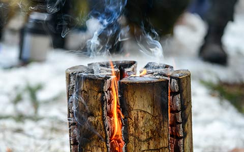 Tree stump removal by fire completely burning it